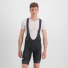 Sportful Kolesarske Hlače Neo Bibshort – kolesarske hlače z naramnicami, neobdelanim notranjim delom in oprijemom na hlačnicah.